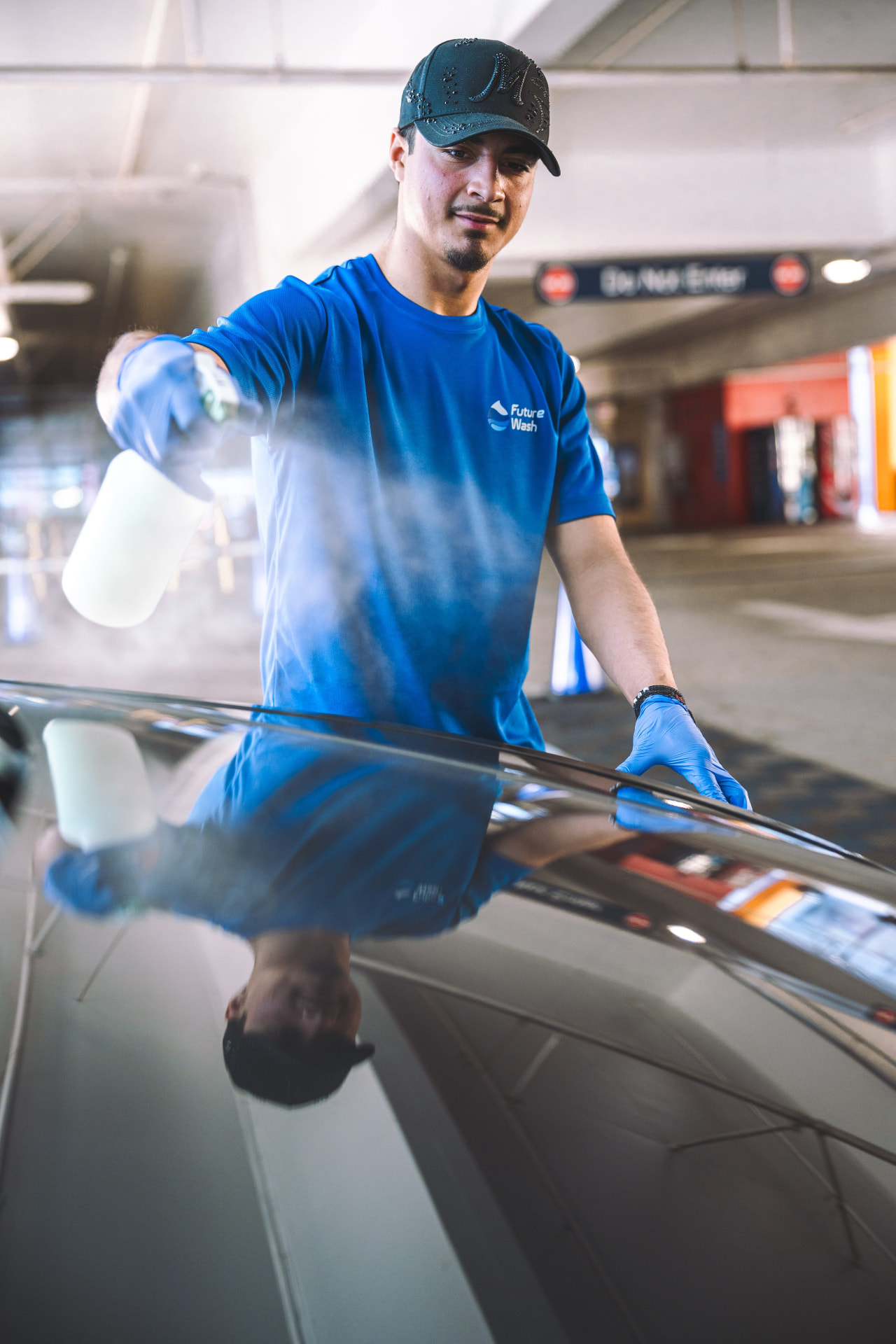 Future Wash technician at work in an office parking lot
